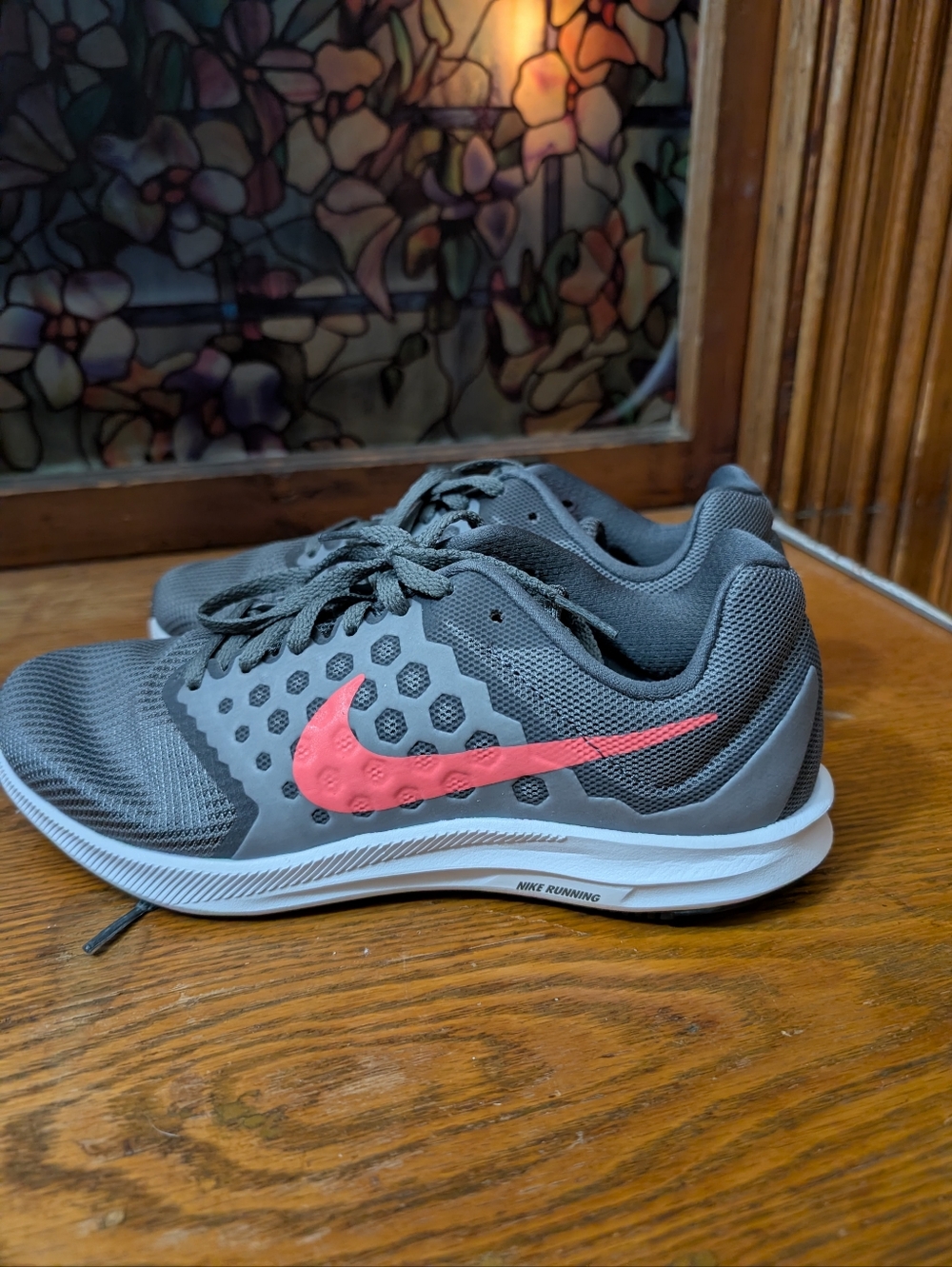 Nike Gray Running Shoes with Pink Swoosh